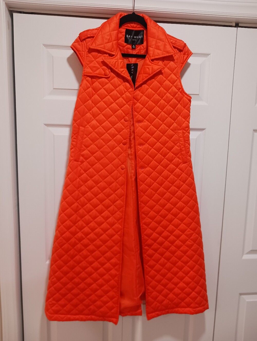 Say What? Quilted Sleeveless Long Coat Dress in Bright Orange